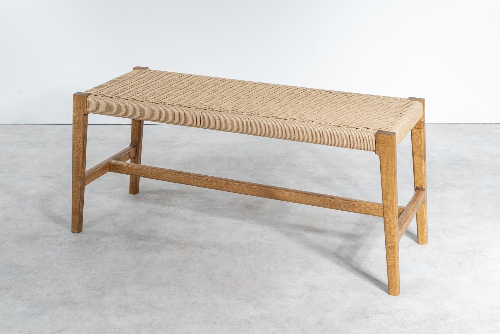 Oak bench with a Danish cord seat by David Wraith